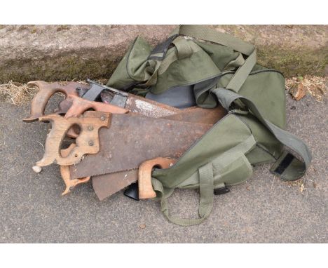 A collection of vintage saws in a carry bag together with a collection of garden tools and a hop up / stool. All used. A litt