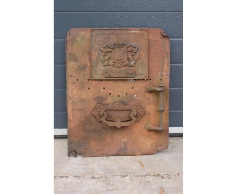 An interesting late 19th century cast metal door (possibly for a furnace / oven) with 'Hanson Tutbury' on the doors with a Co