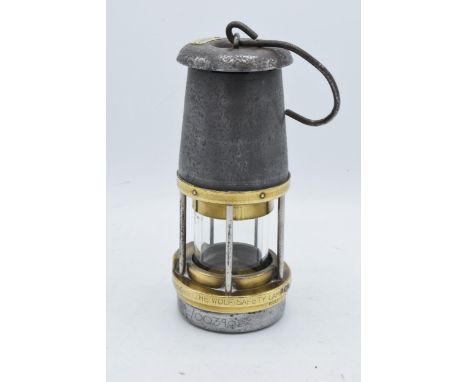 The Wolf Safety Lamp Co W M Maurice Ltd Sheffield miners lamp. Wolf Type FS. P.O.1971. Appears to be in good condition. 23cm 