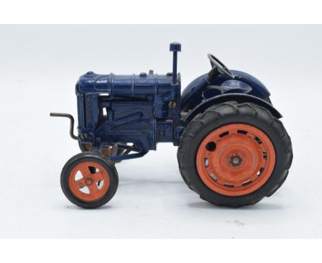 Chad Valley diecast model of a Fordson Major tractor. In used condition though it is mostly present with some damages and req