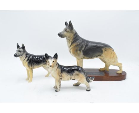 A collection of Beswick to include a Connoisseur model of an Alsatian on base, Alsatian and another similar unmarked item (3)