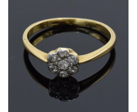 18ct gold daisy ring set with diamonds. UK size O. 2.1 grams. In good condition. 