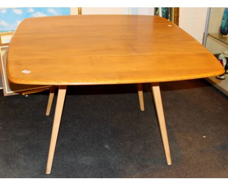 Light oak Ercol dining table with drop leaves 110 x 125 cm extended