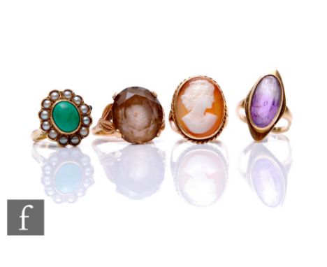 Four assorted 9ct stone set rings to include amethyst and smoky quartz single stones etc, total weight 18.5g, damaged. (4) 