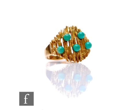 A mid 20th Century 14ct five stone turquoise ring, beads stones set to a pierced bark effect head, weight 6.3g, ring size M 1