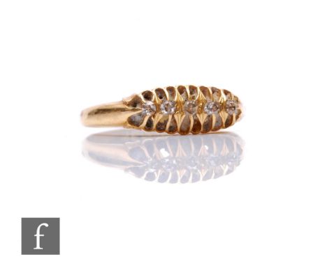 An 18ct hallmarked five stone boat shaped diamond ring, weight 2.8g, ring size R, Birmingham 1902. 