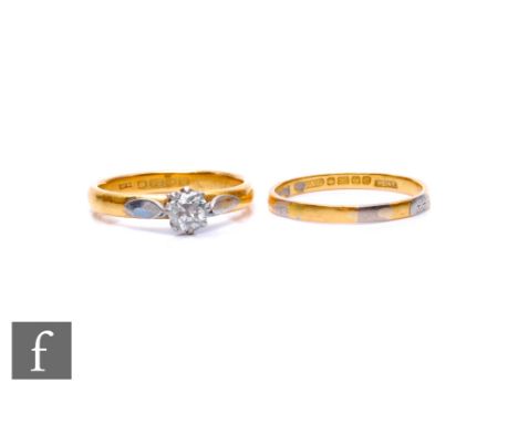 Two 22ct hallmarked rings, one set with a single diamond, the other a two coloured wedding ring, total weight 8.2g, some dama