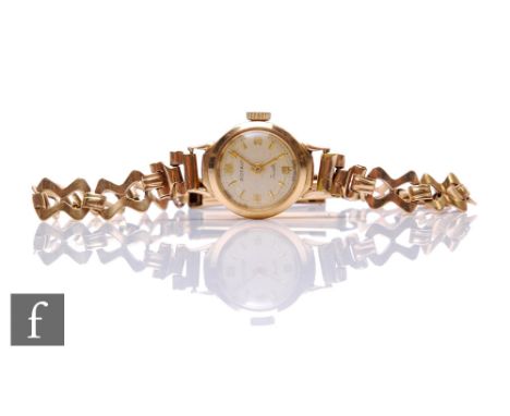 A lady's 9ct hallmarked Rotary manual wind wrist watch to a 9ct bracelet, total weight 11.5g. 