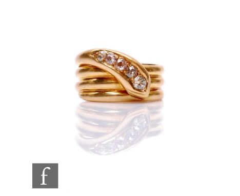 An early 20th Century 18ct hallmarked three coil snake ring with five graduated old cut diamonds to head, weight 10g, ring si
