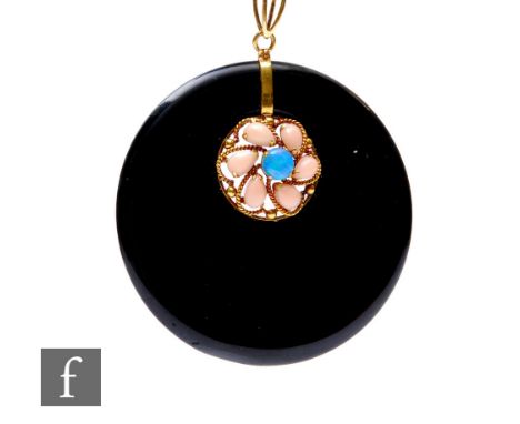 A 14ct set black onyx, coral and opal set circular pendant, weight 27g, diameter 55mm, stamped 14k. 