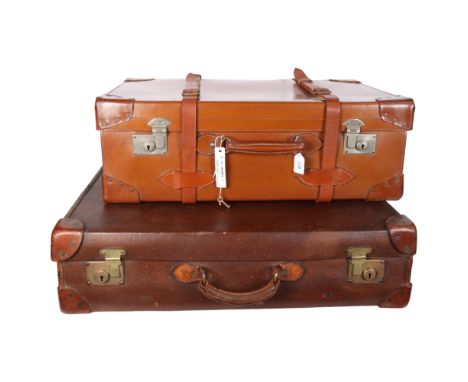 Early 20th century leather travelling trunk, with straps, 71cm across, and another case, initialled B surmounted by a crown 