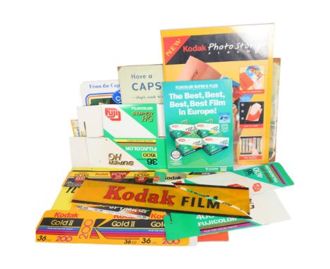 A collection of various advertising posters, panels and boards, including Kodak, Capstan, Cape, etc 