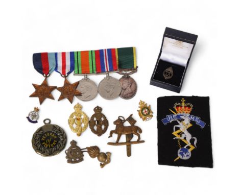 A group of 4 Second World War medals, including the France and Germany Star, and a George V Efficient Service medal, Territor