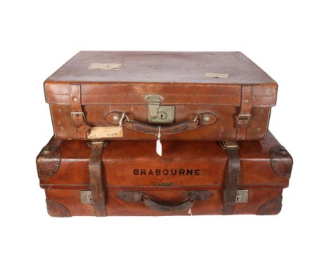 A Brabourne leather trunk, 82cm across, and a smaller leather suitcase with straps 