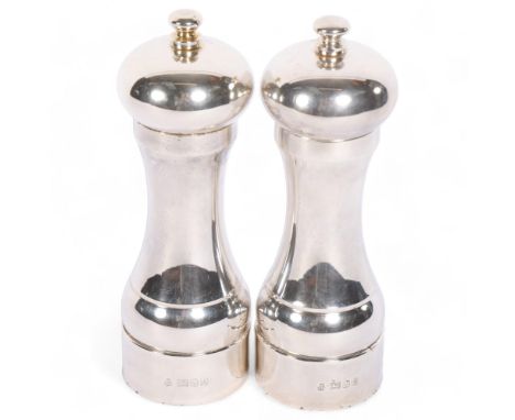 An Elizabeth II silver "Peter Piper" pepper grinder and salt grinder, H15.5cm, maker's marks for MC Hersey &amp; Son Ltd, Lon