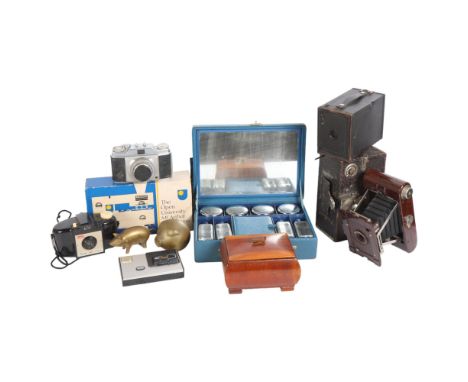 A selection of Vintage cameras, including a Kodak Brownie 127, a Kodak Disc 4000, in original box, a Kodak Brownie, The Open 