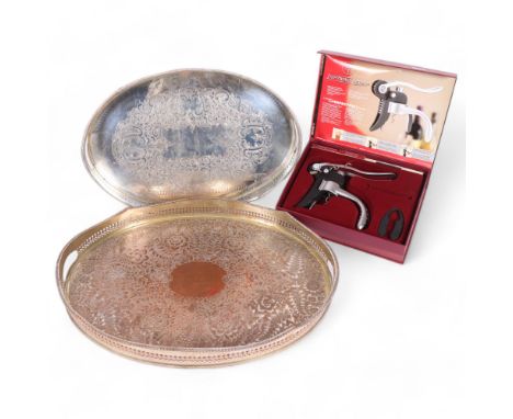 2 oval 2-handled galleried silver plated serving trays, and a boxed lightning lever corkscrew 