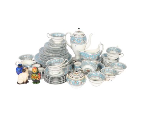 A Wedgwood Florentine dinner and coffee service, including coffee pot, milk and sugar bowl, sauce boat, tureen, etc (69 piece