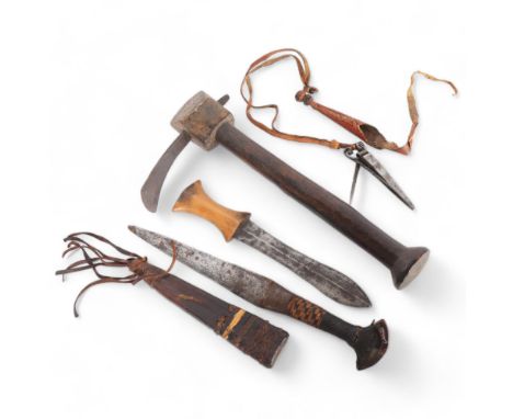 A group of African tools and knives, including a carving adze, a leather sheathed knife, Congo knife, etc (4) 