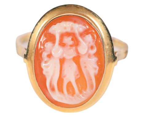 An 18ct gold ring, set with relief carved shell cameo oval panel, depicting the Three Graces, size R 