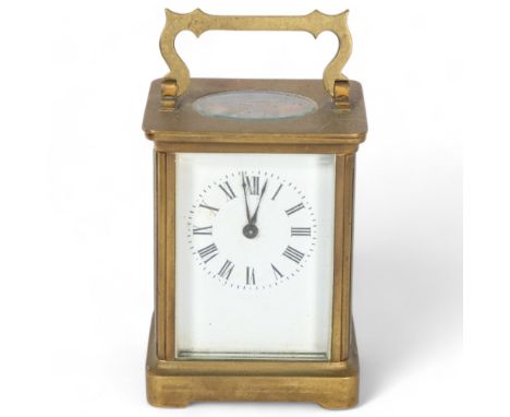 A French brass-cased carriage clock with enamel dial, H11.5cm, not including handleCurrently not in working order 