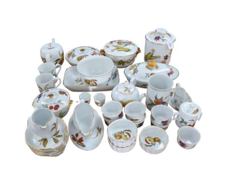 A large quantity of Royal Worcester Evesham pattern table and dinnerware, comprising lidded tureens, sauce boats, teapot, ram