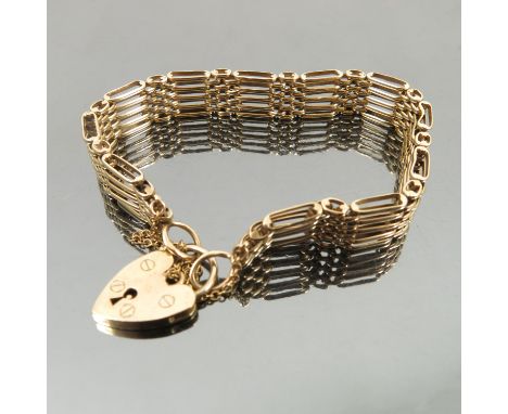 A 9 carat gold bracelet, of pine bar gate links to a padlock clasp, weight 17.9g gross