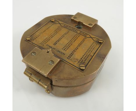 A Stanley London brass cased compass, with hinged mirrored cover and Natural Sine scale