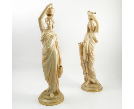 A pair of Royal Worcester blush ivory figures, Eastern water carriers, af and possibly restored, height 20.5ins Condition rep