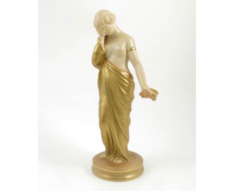 A Royal Worcester gilded ivory figure, Sorrow, shape number 2/57, dated 1915, height 9.5ins Condition report: Good - although