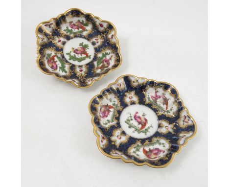 A pair of Samson of Paris porcelain dishes, of shaped circular form, decorated with reserves of fabulous birds and insects, m
