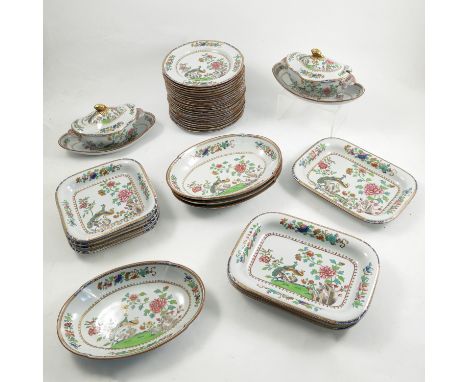 A quantity of Spode Indian Tree pattern dinnerware, comprising twenty two plates 8.25ins, four oval dishes 10.25ins, two cove