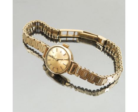 A Tissot ladies 9 carat gold bracelet watch, weight 11.5g gross, excluding the  movement