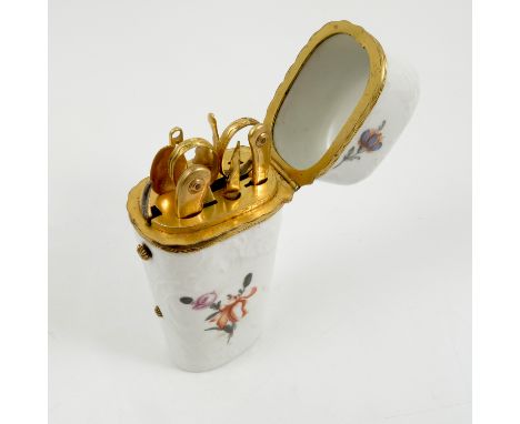 A 19th century Continental porcelain etui, the embossed white body decorated with floral sprays, with gilt metal mounts, the 
