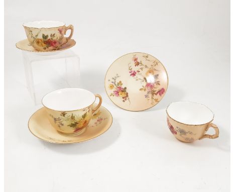 Three Royal Worcester blush ivory cups and saucers, printed painted with floral sprays, various dates