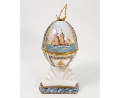 A Royal Worcester limited edition egg, The Ocean Racing Egg, modelled by Ken Potts, dated 1987, the cover decorated with sail