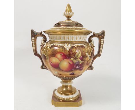 A Royal Worcester covered pedestal vase, hand painted with fruit to a mossy background by T Nutt, shape number H 314, height 