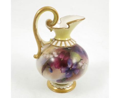 A Royal Worcester Hadley Ware ewer, decorated with flowers to a yellow and gilt neck and handle, dated 1905, height 4.5ins