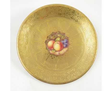 A Royal Worcester cabinet plate, the centre hand painted with fruit to a mossy background by Price, with deep acid gilt borde