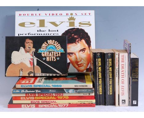 Elvis Presley, a collection of memorabilia to include two albums of First Day Covers, a sheet of 40 stamps, various annuals, 