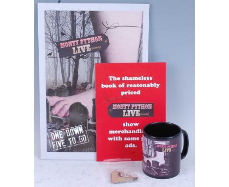 A small collection of music and film memorabilia, to include Monty Python Live (mostly) programme, pamphlet, mug and keyring,