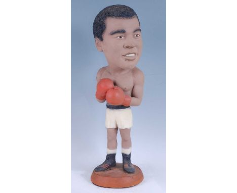 A large late 20th century American painted ceramic model of Muhammad Ali (1942-2016), American Boxer and Former World Heavywe