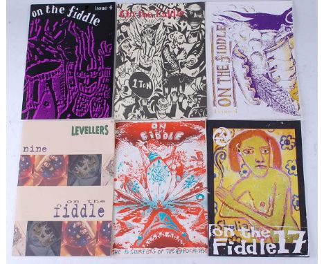 The Levellers, twelve issues of the fan club magazine On The Fiddle to include No.1, together with various tablature to inclu