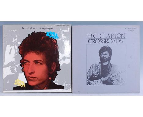 Bob Dylan - Biograph, 3 CD Deluxe Edition box-set, together with Eric Clapton - Crossroads 4 CD Edition box-set. (2)