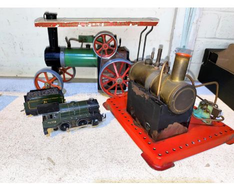 A vintage Mamod steam tractor, a similar stationary engine in a clockwork loco and tender 