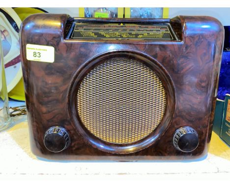 A vintage Bush, tortoise shell effect, Bakelite mains radio. (collectors item only) 