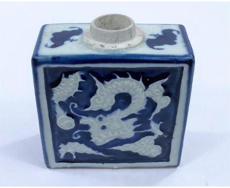 A Chinese blue and white tea caddy, the square body decorated with dragons and cloud with bats to shoulders, height 12cm (no 