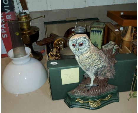 A brass oil lamp and shade; a selection of clocks; metalware; etc. 