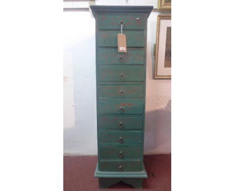A green painted teak pedestal chest of ten drawers, raised on bracket feet, H.135 W.41 D.47cm 