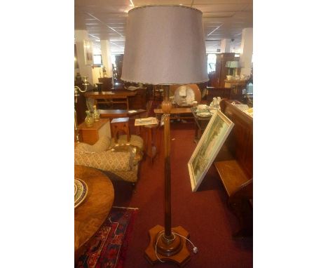 An early 20th century mahogany standard lamp, with green shade and reeded column, H.190cm 